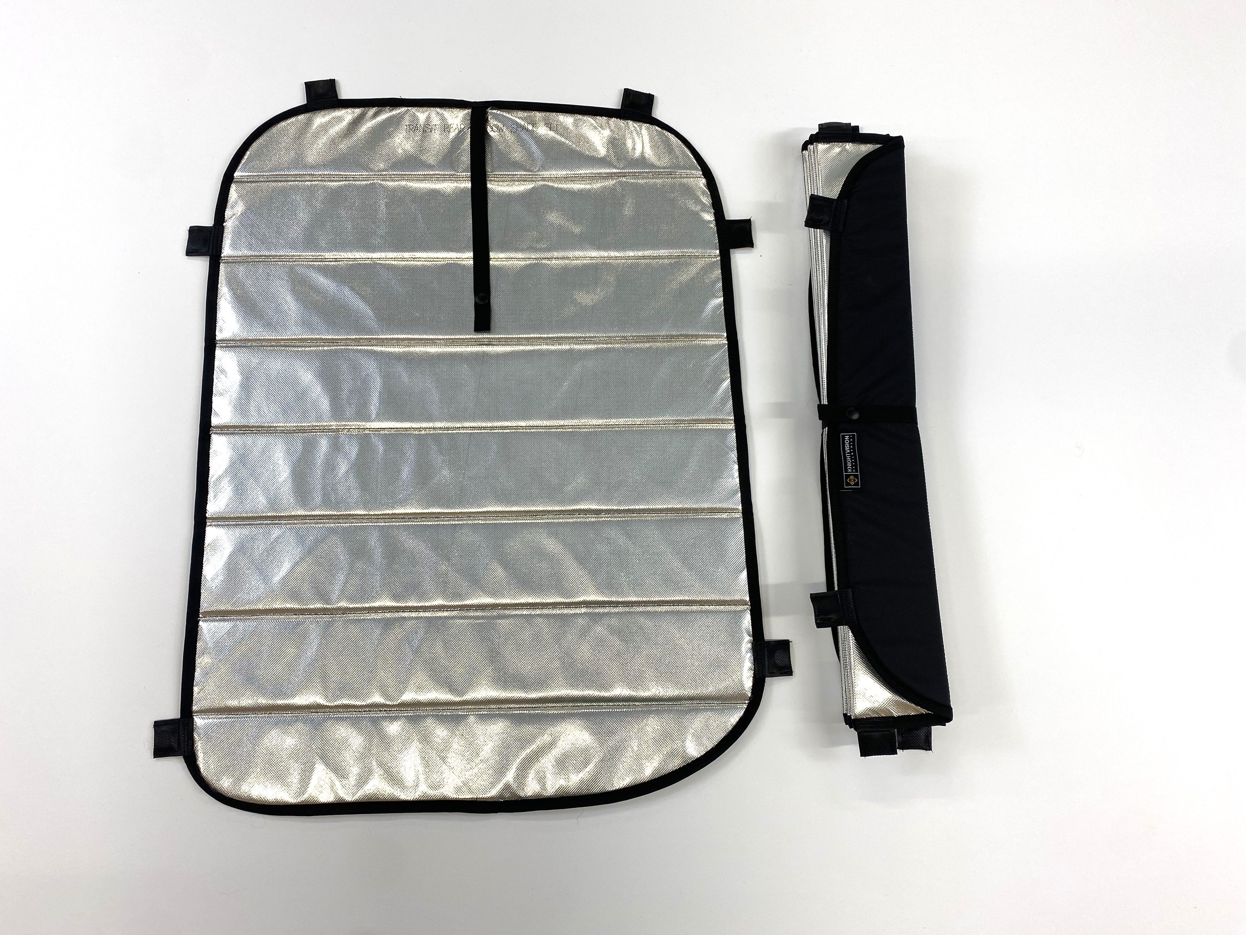Folded and unfolded reflective window covers with black trim and integrated straps for compact storage