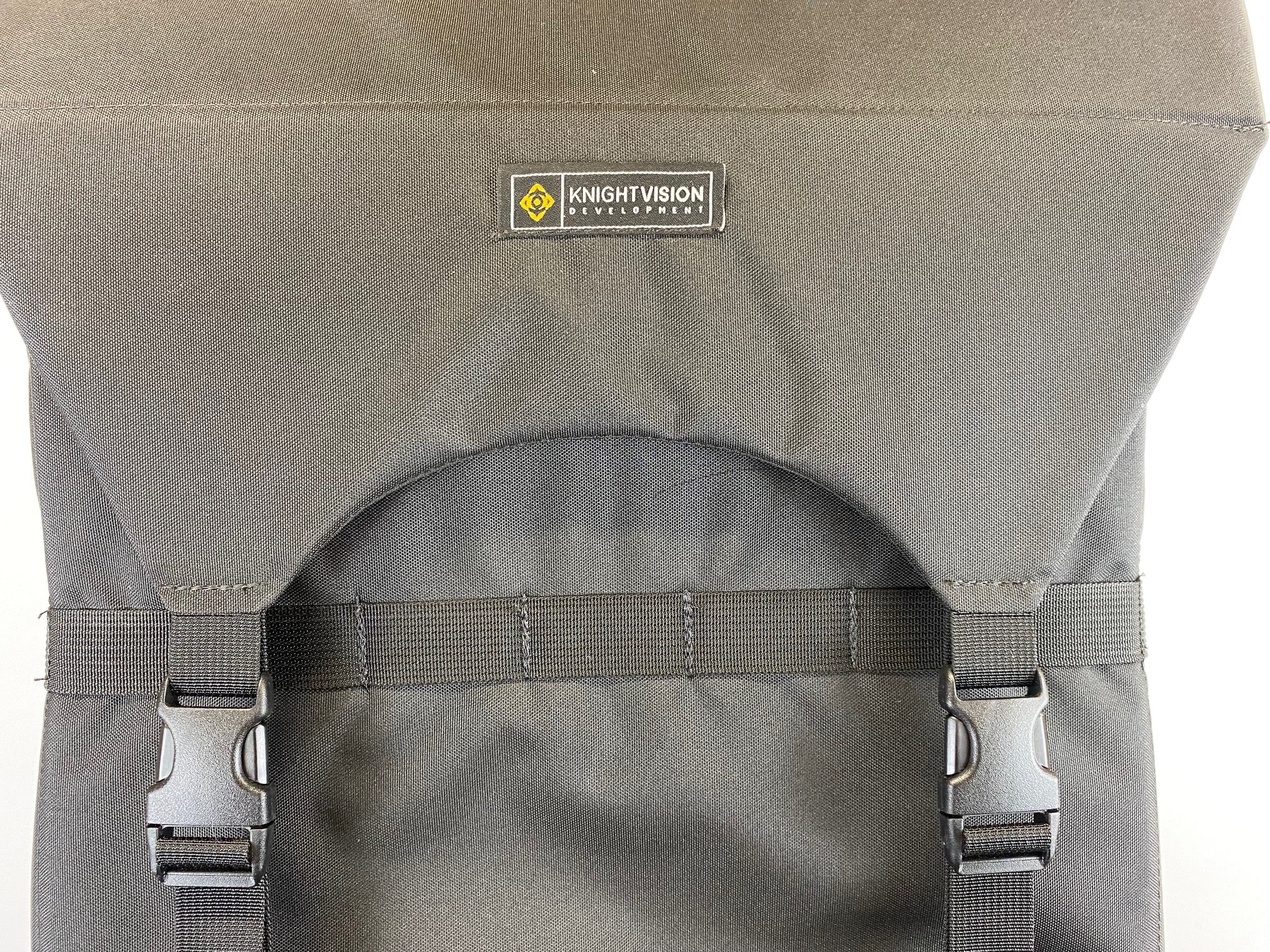 A gray motor vehicle carrying rack with a label that reads 'Kight Vision'.