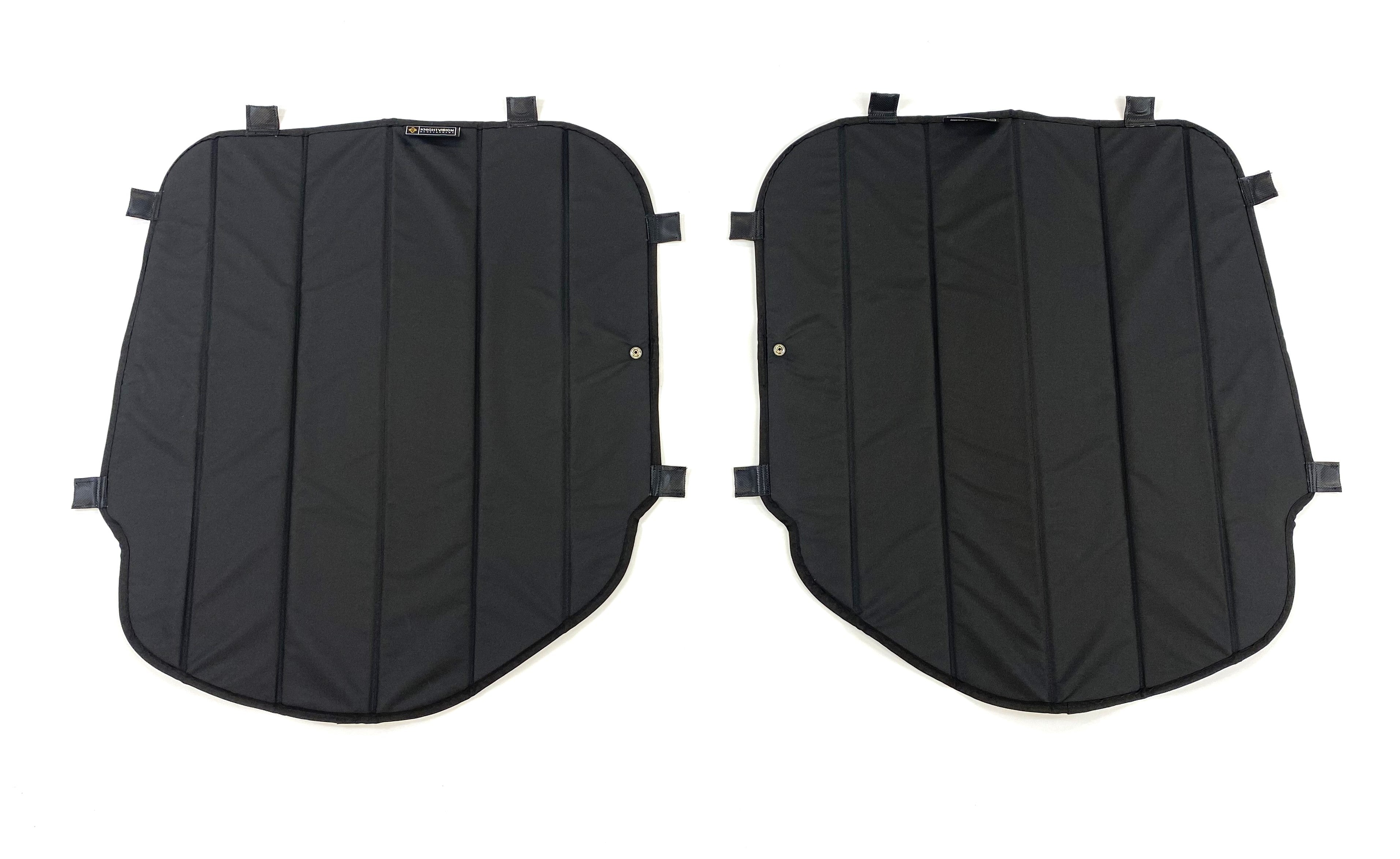 Pair of black insulated window covers with stitched panels and multiple attachment tabs for vehicle interior use.
