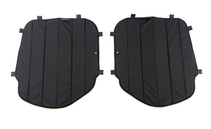 Pair of black insulated window covers with stitched panels and multiple attachment tabs for vehicle interior use.