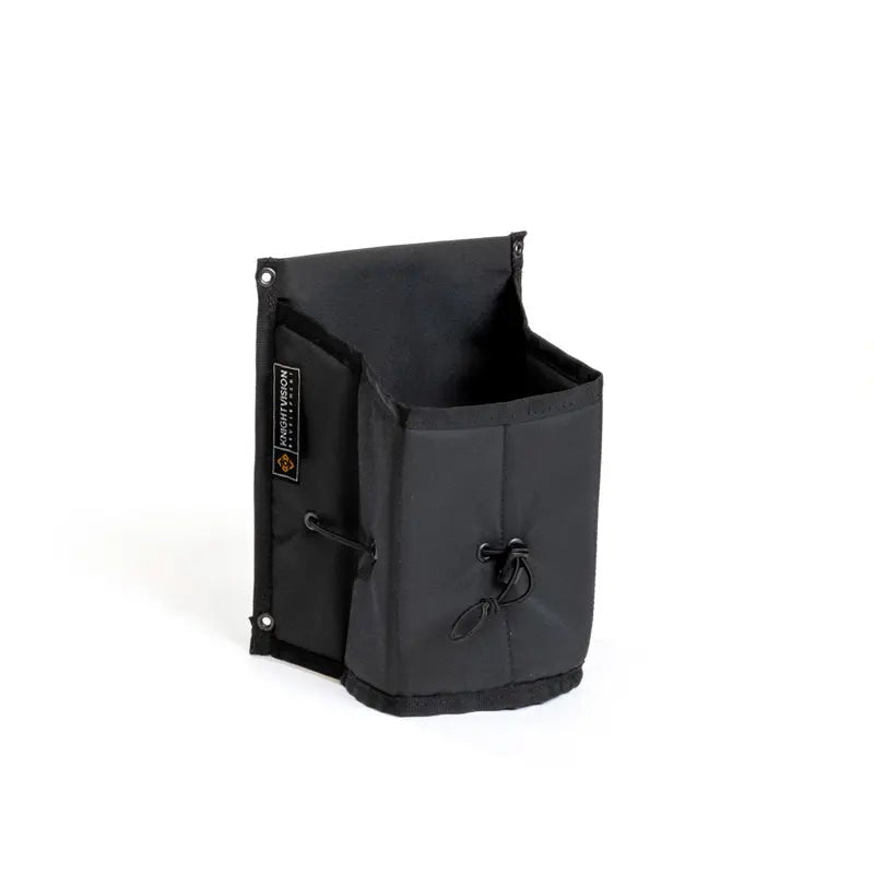 The Growler Cache by Knight Vision Development shown empty, with its black fabric construction and open top.