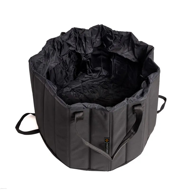 This image shows the freestanding black basin from The Portable Shower System by KnightVision Development. It’s fully expanded, lightweight, and collapsible — designed for easy use and drainage in camper vans, overlanding rigs, or off-grid setups.