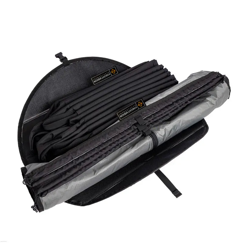 The Portable Shower System shown unrolled with visible compartments, demonstrating organized, compact storage. Ideal for van life, camping, or overlanding setups.